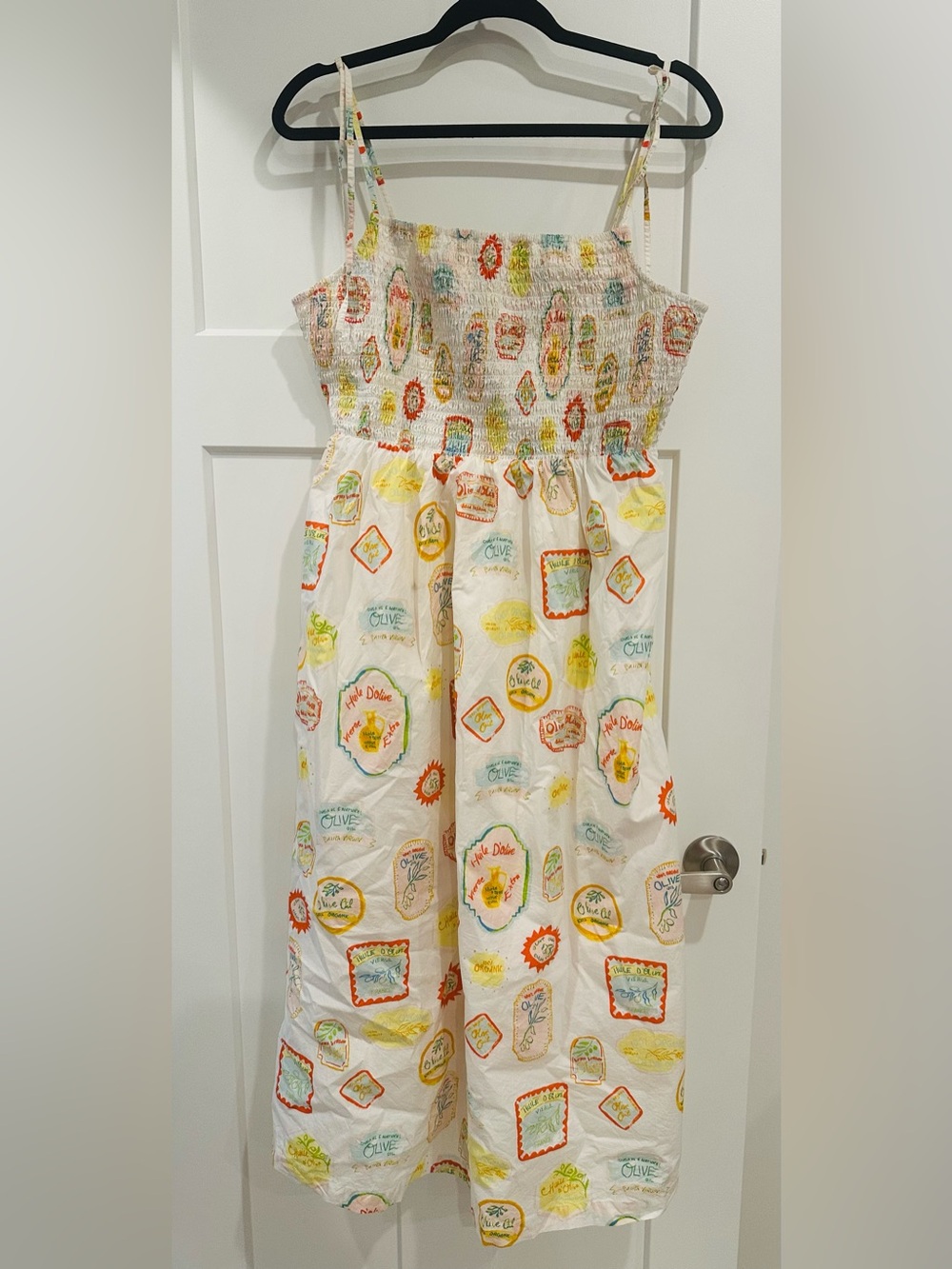 Smocked White Sundress with Travachic Colorful Label Print